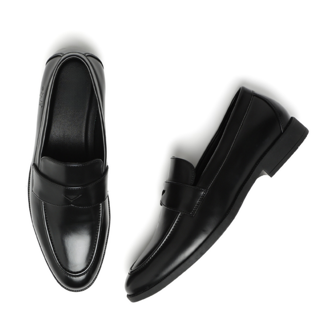 A pair of black leather penny loafers shown from the front and side angles on a clean white background.