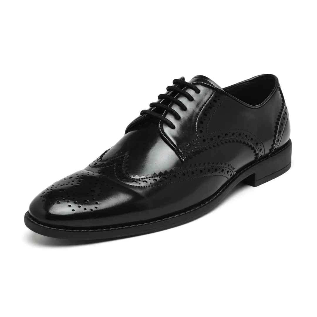 black dress shoe on a white background